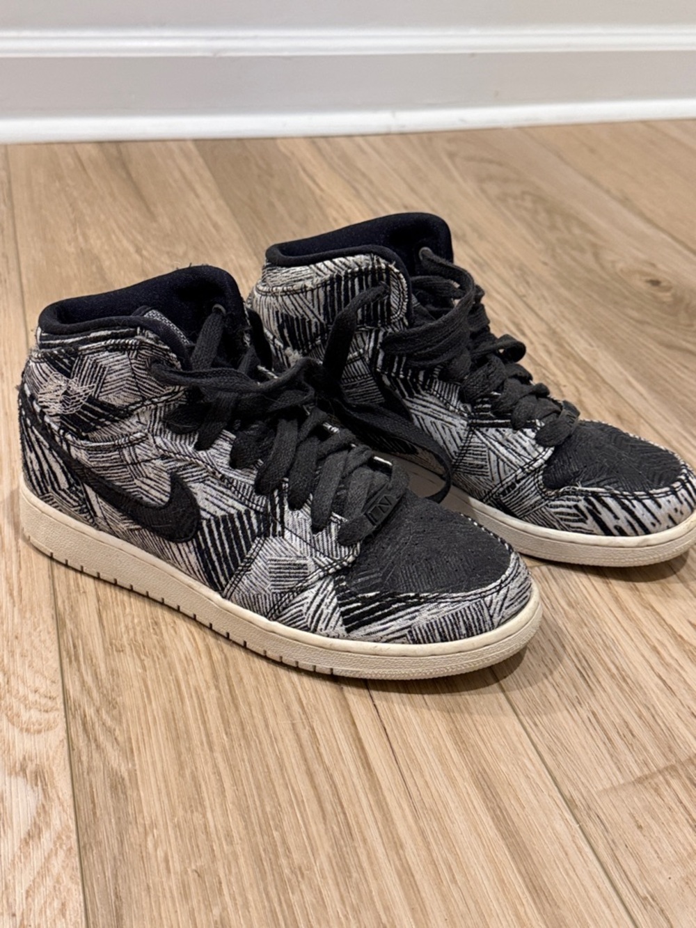 Nike Air Jordan BHM Black and White High-Top Sneakers